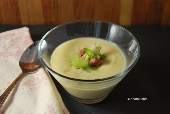 celery root and leek soup topped with celery, apples and bacon