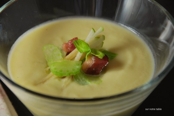 celery root and leek soup topped with celery, apples and bacon